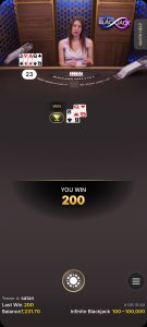 Blackjack game screen showing a winning hand and payout on mobile.