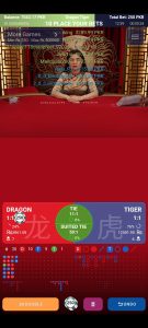 Dragon Tiger game table with placed bet and live dealer.